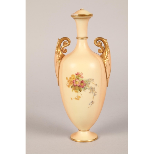 13 - A Royal Worcester twin handled vase, decorated with hand painted wild flowers, shape G790, date code... 