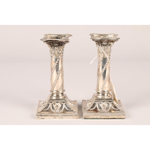 160 - Pair Victorian 'Adam Style' silver candle sticks, raised on square stepped bases, assay marked, Lond... 