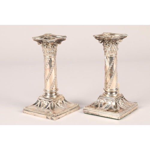 160 - Pair Victorian 'Adam Style' silver candle sticks, raised on square stepped bases, assay marked, Lond... 