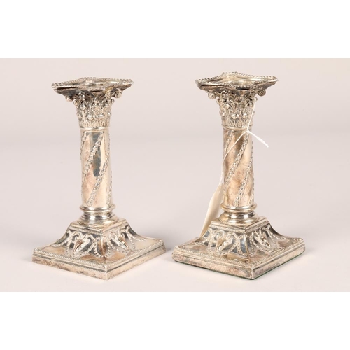 160 - Pair Victorian 'Adam Style' silver candle sticks, raised on square stepped bases, assay marked, Lond... 