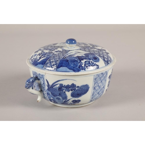 23 - Chinese underglaze blue bowl and cover, with handles from a dragons head, decorated with panels of r... 