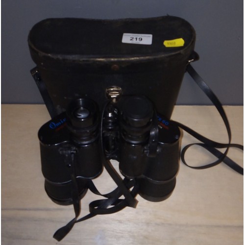 219 - Cased pair of binoculars