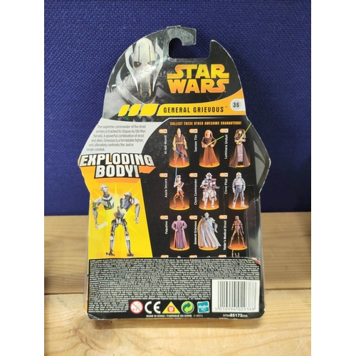 64 - Star Wars - Group of seven original and sealed 2005 'Revenge of the Sith' figures comprising of Obi-... 