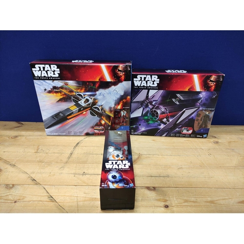 90 - Star Wars - Three boxed 'The Force Awakens' figures comprising of BB-8 B7690, Poe's X-Wing Fighter B... 