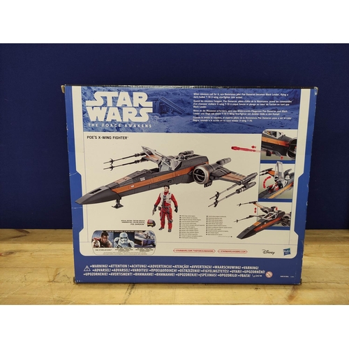 90 - Star Wars - Three boxed 'The Force Awakens' figures comprising of BB-8 B7690, Poe's X-Wing Fighter B... 