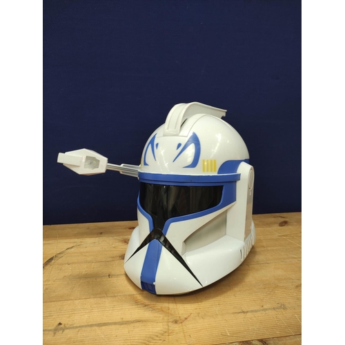 94 - Star Wars - Three 2008 Hasbro 'The Clone Wars' helmets comprising of Clone trooper and two Captain R... 