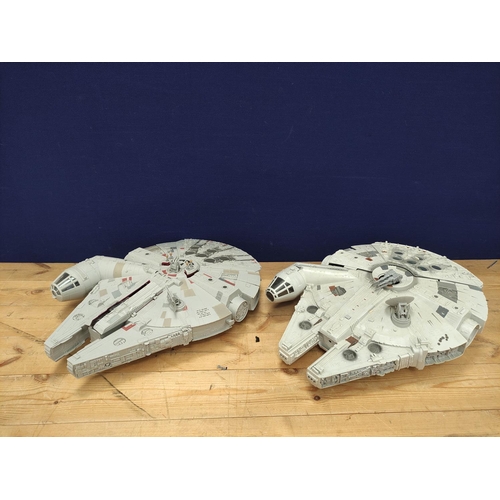 114 - Star Wars - Two contemporary Millennium Falcon models with removable panels.