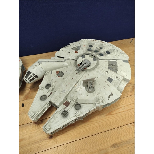 114 - Star Wars - Two contemporary Millennium Falcon models with removable panels.