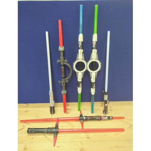 107 - Star Wars - Quantity of toy light sabers to include two General Grievous double sabers, two Kylo Ren... 