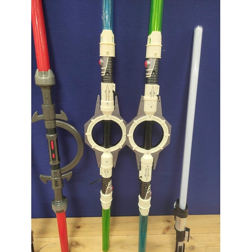 107 - Star Wars - Quantity of toy light sabers to include two General Grievous double sabers, two Kylo Ren... 