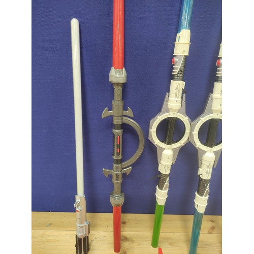 107 - Star Wars - Quantity of toy light sabers to include two General Grievous double sabers, two Kylo Ren... 