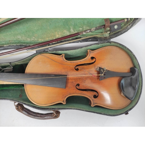 457 - Cased violin with the bridge inside inscribed DE Jacques, J.S.Pot 3.134.287 made in France with two ... 