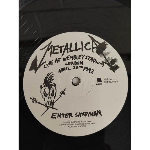 Metallic box-set comprising of 3 records, Live at Wembley Stadium