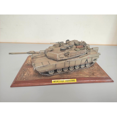 47 - Four collector's model military vehicles. To include  a German 88mm Flak 36 On Trolley, M1A1-HA... 