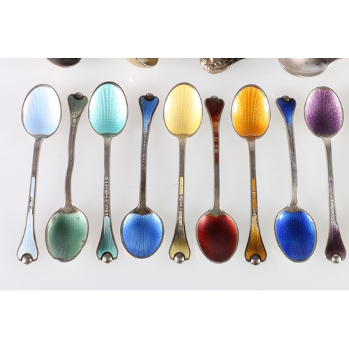 107 - Set of twelve Norwegian sterling silver enamelled teaspoons, 126g, and a collection of silver teaspo... 