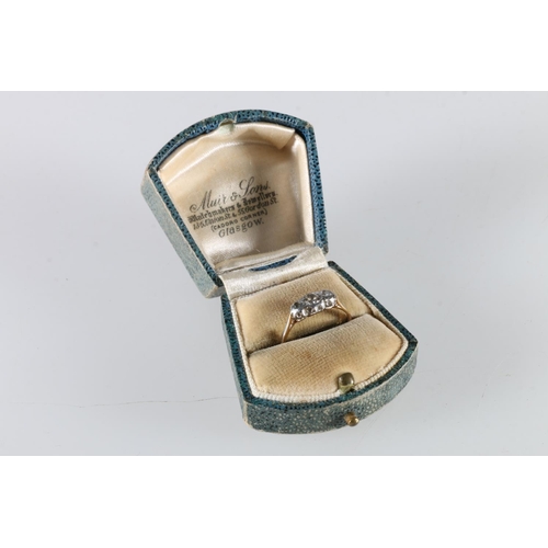 110 - Yellow gold and platinum (unhallmarked) three stone diamond ring, size M, 1.7g, in antique box.