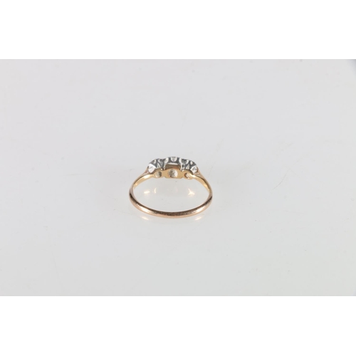 110 - Yellow gold and platinum (unhallmarked) three stone diamond ring, size M, 1.7g, in antique box.