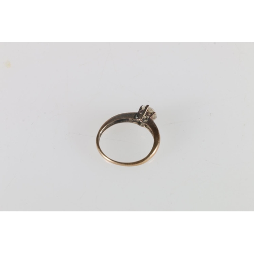 114 - 9K gold CZ set dress ring, 1.8g.