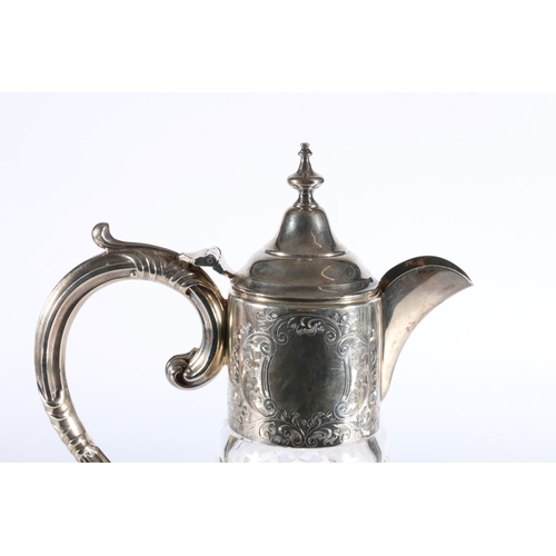 133 - Sterling silver mounted heavily cut glass claret jug of typical form, Garrard and Co, Birmingham, 19... 