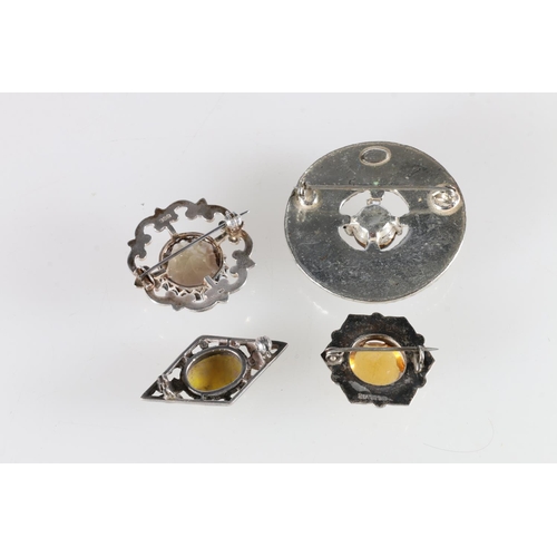 141 - Sterling silver citrine set brooch, Thomas Kerr Ebbutt, Edinburgh, silver faceted stone and pebble s... 