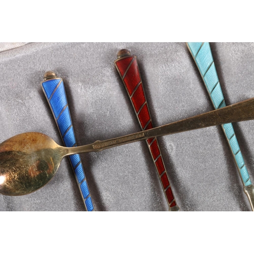 162 - Cased set of six Danish sterling silver enamelled spoons, Egon Laurisden, 53g.