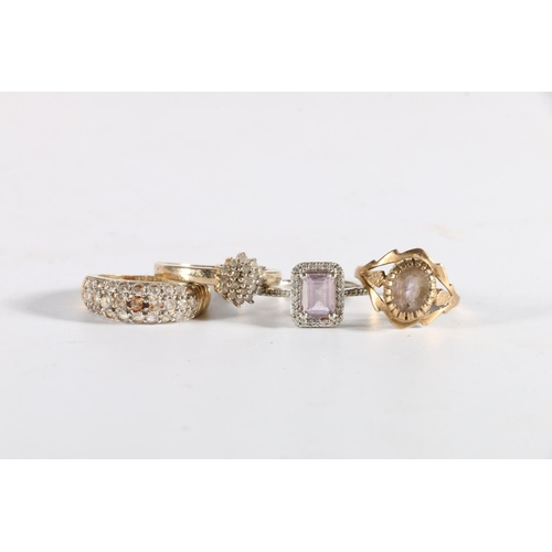 169 - Four 9ct gold dress rings to include a diamond set ring, 10g.