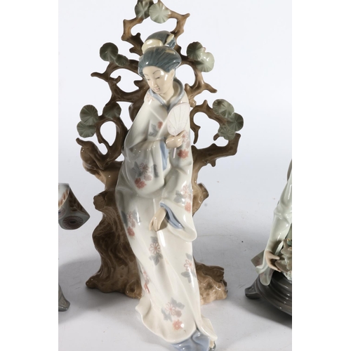 178 - Four Lladro Spanish porcelain figurines to include 4807 Geisha with fan, 5775 crouching Geisha with ... 