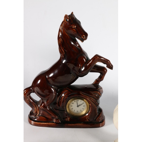 187 - Mid-century pottery horse clock in the manner of Jema 32cm tall, a Dartmouth gurgle jug, a Rush... 