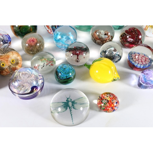 192 - Collection of art glass paperweights to including two Victorian green glass dumps, Selkirk Glass inc... 