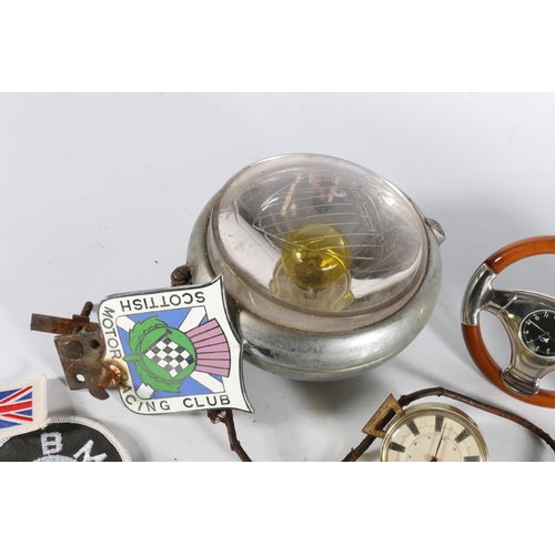 206 - Vintage Marchal Grande Portee 642 car head lamp, a Smith's of London dash clock, a clock in the form... 