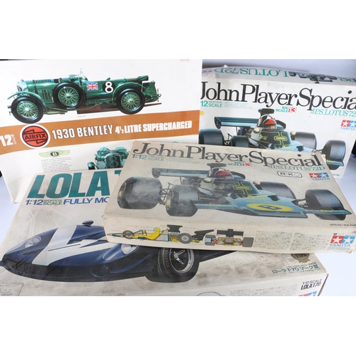 208 - Tamiya 1:12 scale BS1215 Lola T-70 mkIII model kit, two Tamiya 1:12 scale BS1213 John Player Special... 