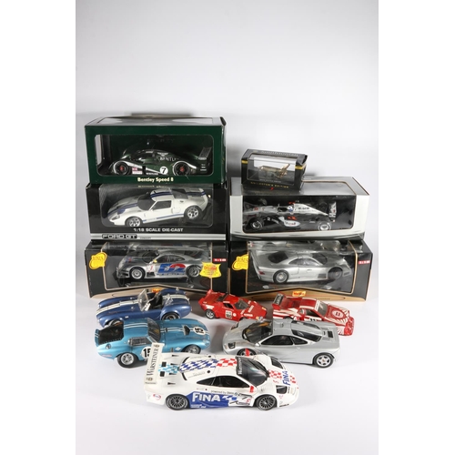 209 - Five boxed diecast model vehicles to include an Auto Art Moddels Bentley Speed 8, a Pauls Model Art ... 