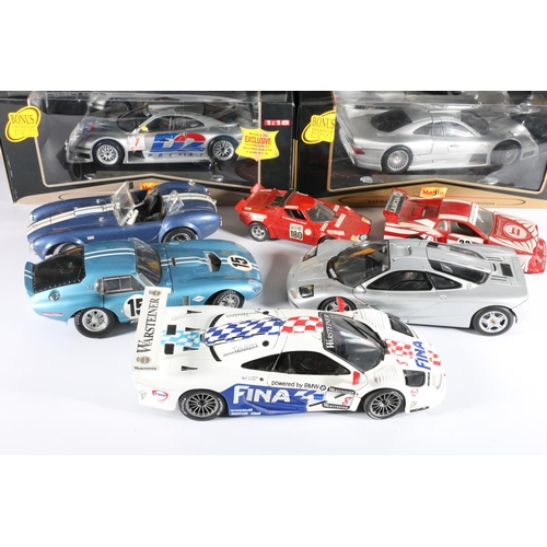 209 - Five boxed diecast model vehicles to include an Auto Art Moddels Bentley Speed 8, a Pauls Model Art ... 