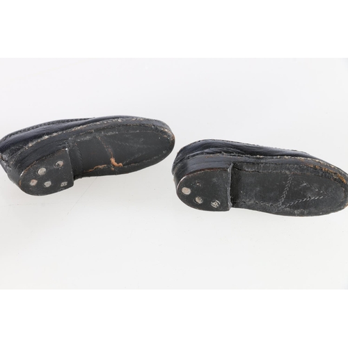 247 - A pair of miniature leather shoes, possibly for a doll with carved wood 'shoe tree' blocks, 6cm long... 