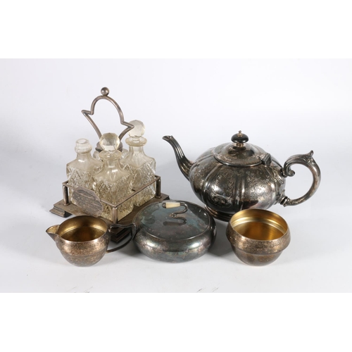 261 - Silver plated ware to include a butter dish in the form of a curling stone, a tea set and a condimen... 