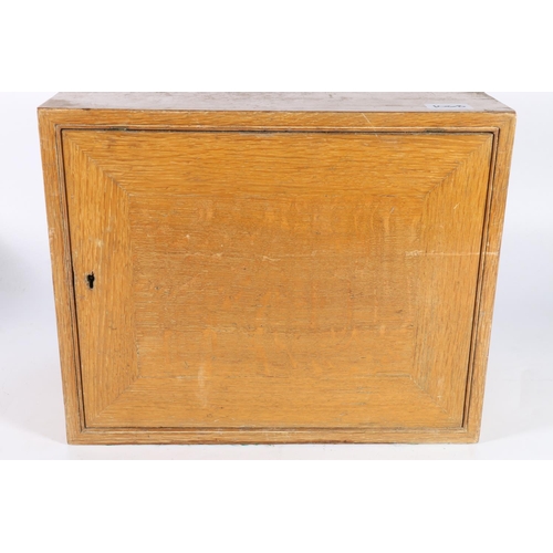 268 - Early to mid-20th century oak cased portable desk stand with revolving feature revealing a stationar... 