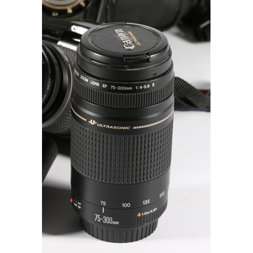 274 - Canon EOS500 SLR camera fitted with a Canon Zoom Lens EF 28-80mm 1:3.5-5.6 III, Canon Zoom lens EF 7... 