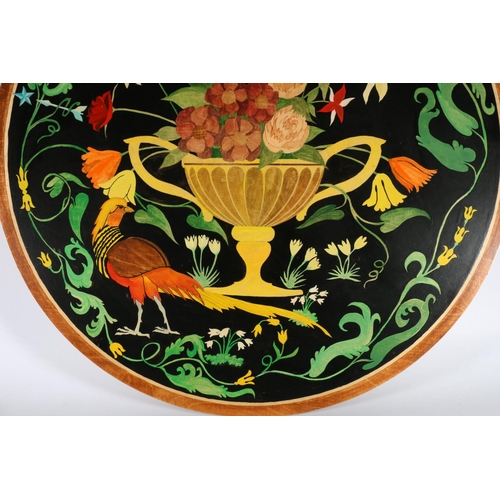 302 - Painted plywood circular panel depicting a urn of flowers within a wreath with butterflies and insec... 