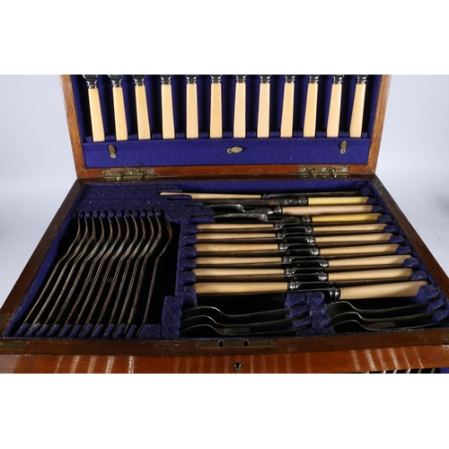 303 - W Landell of Glasgow silver plated EPNS suite of flatware contained with an oak table canteen, 45cm ... 