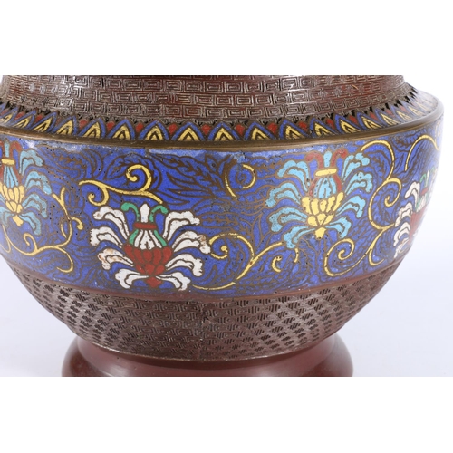 313 - Oriental bronze cloisonne jardiniere decorated with a band of flowers, stamped 'Made in Japan' to th... 