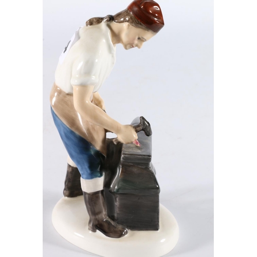 354 - Royal Doulton figurine HN2240 The Blacksmith of Williamsburg, 18cm tall.