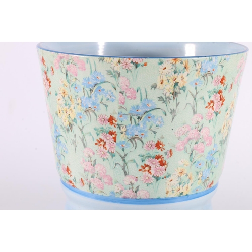 355 - Art Deco Shelley Melody pattern vase with transfer printed chintz floral upper section, 24cm tall.&n... 