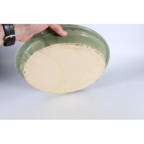 376 - Oriental style celadon glazed dish, 36cm diameter.