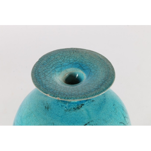 378 - Oriental style turquoise glazed raku fired vase, 19cm tall. 