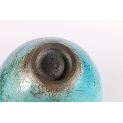 378 - Oriental style turquoise glazed raku fired vase, 19cm tall. 