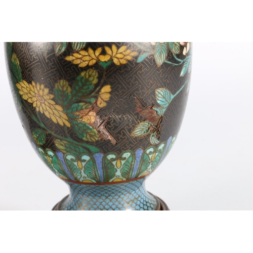 382 - Pair of Chinese cloisonné enamel vases raised on carved wood stands, 28cm tall. (2)