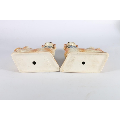 399 - Pair of Bo'Ness style pottery mantel spaniel dogs, registration number to base '542671', 18.5cm tall... 