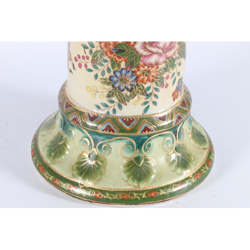 425 - Regency Ironstone pottery jardinière on stand decorated with insects and flowers, 62cm tall.