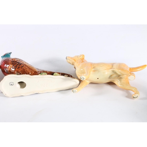 426 - Beswick Pheasant number 122 and two Beswick Golden Retriever Labradors 'Solomon of Wendover' model n... 