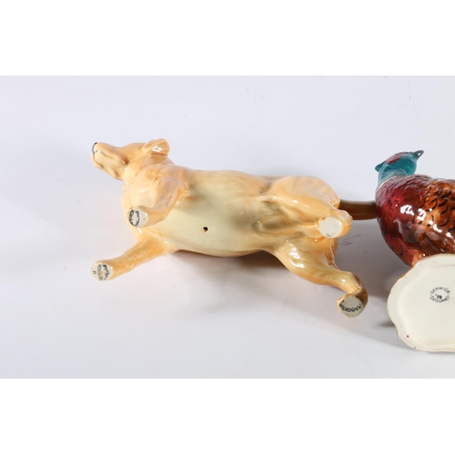 426 - Beswick Pheasant number 122 and two Beswick Golden Retriever Labradors 'Solomon of Wendover' model n... 